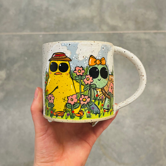 Turtle & Duck Picking Pink Flowers Mug
